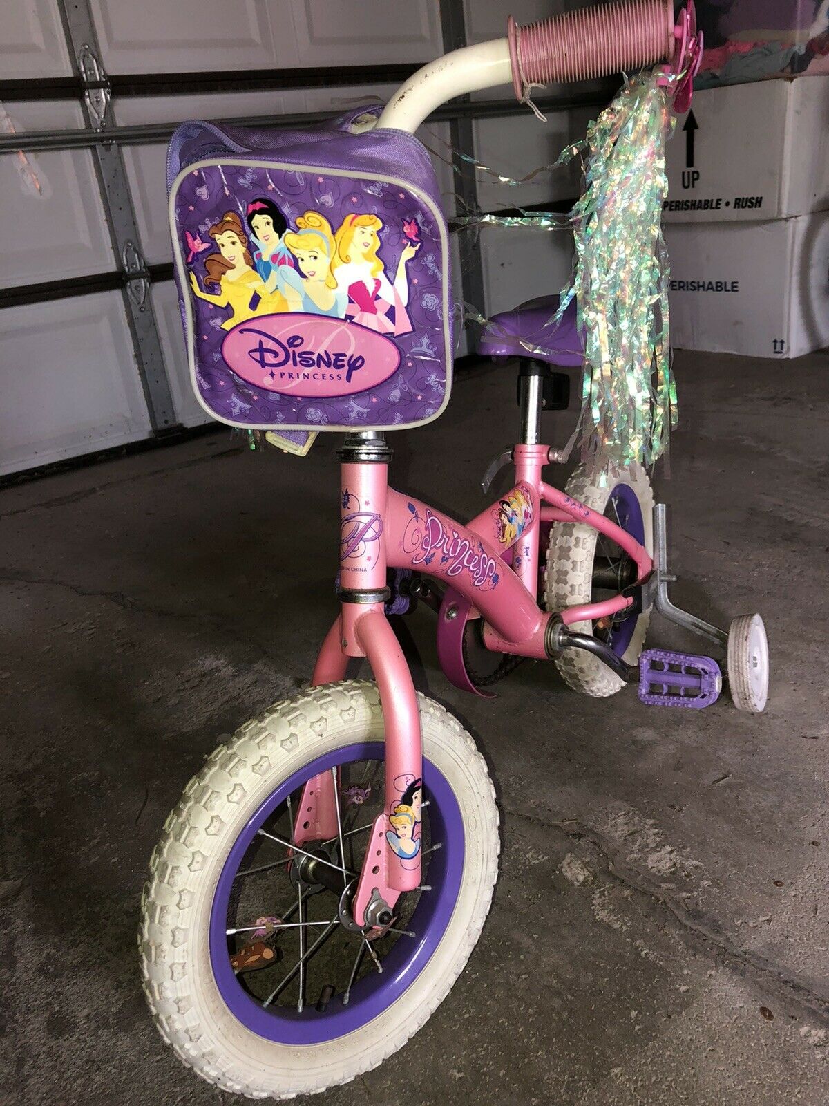 Girl’s bike - 12” Disney Princess w/ training wheels, bell and bag PICKUP ONLY - Fresh Stock Dated January 2026