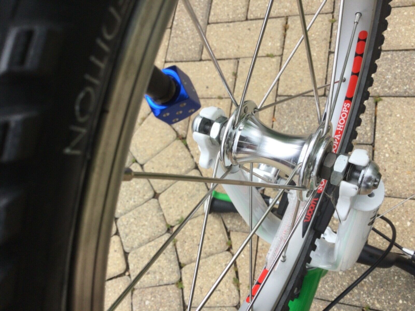 Woom 3 bike (green) Excellent condition. 16” freewheel - Fresh Stock Dated December 2025