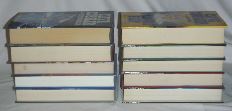 pick one - Clive Cussler - DIRK PITT - hardcover books - HC DJ firewood - one pb - Fresh Stock Dated January 2026
