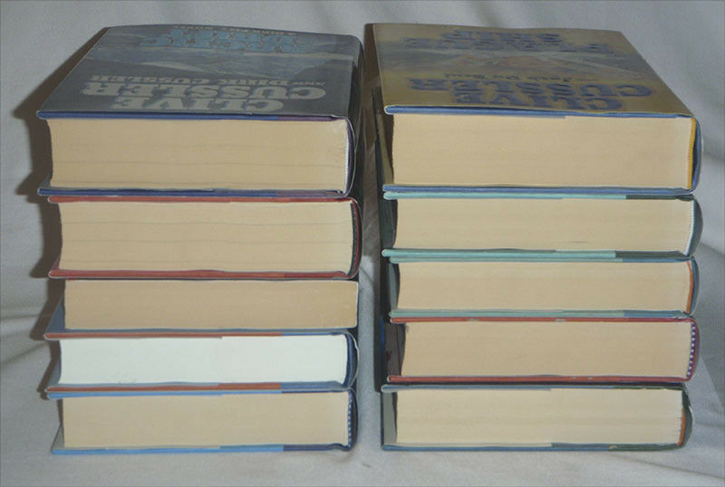 pick one - Clive Cussler - DIRK PITT - hardcover books - HC DJ firewood - one pb - Fresh Stock Dated January 2026