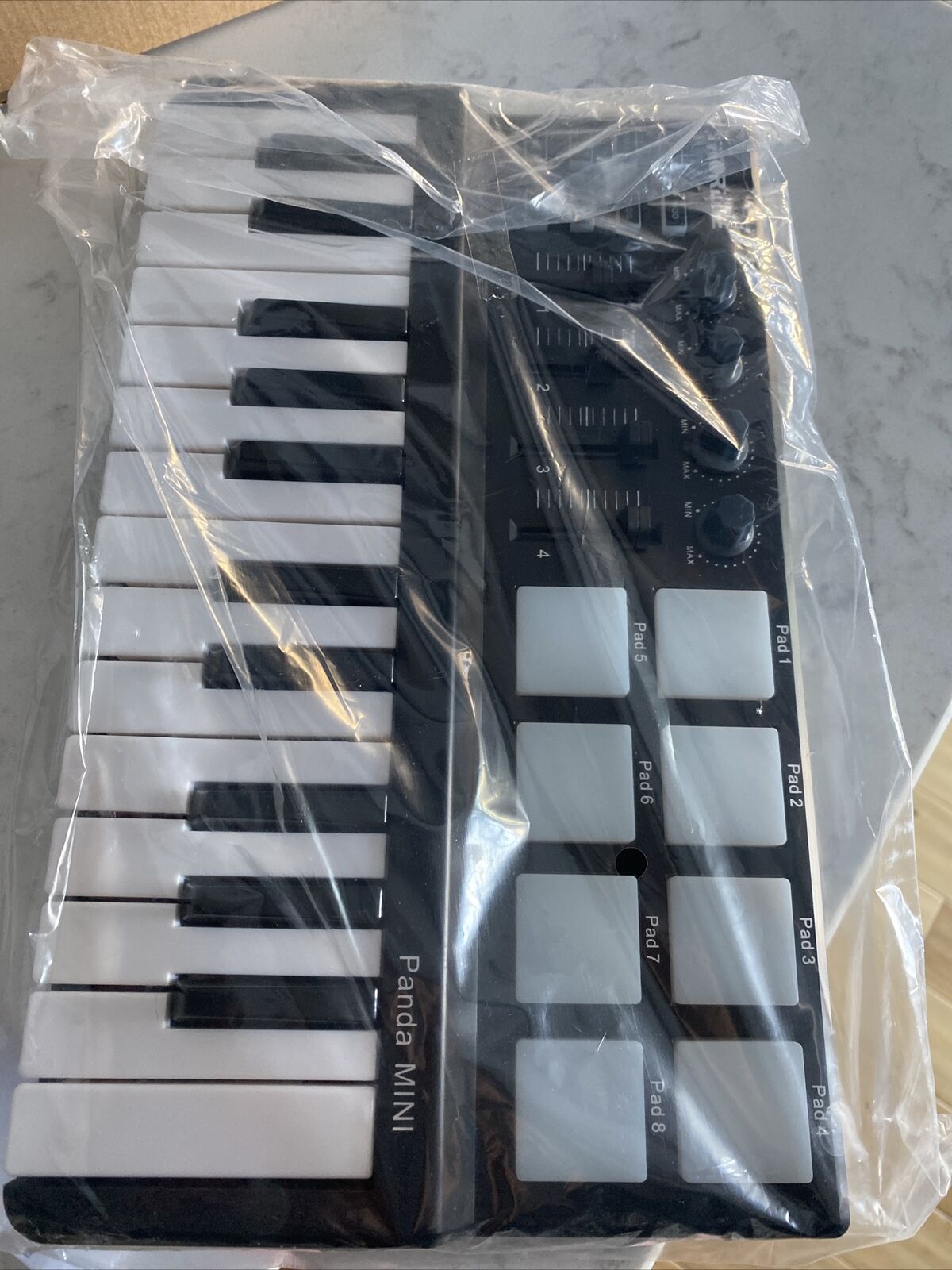 Worlde Panda Mini 25-Key Portable USB Keyboard Drum Pad MIDI electric Controller - Fresh Stock Dated December 2025