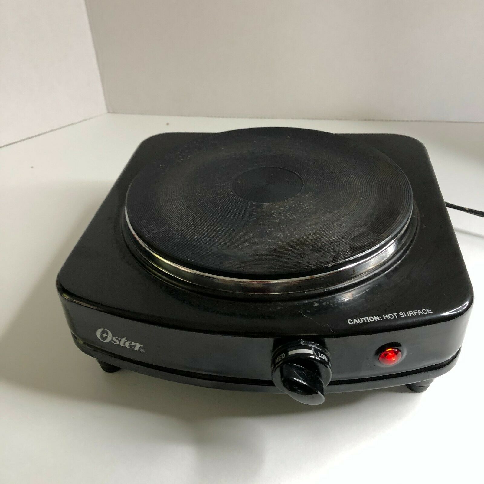 OSTER kitchen burner Hotplate Black Solid Single CKSTSB100-B 900 Watts - Fresh Stock Dated February 2026