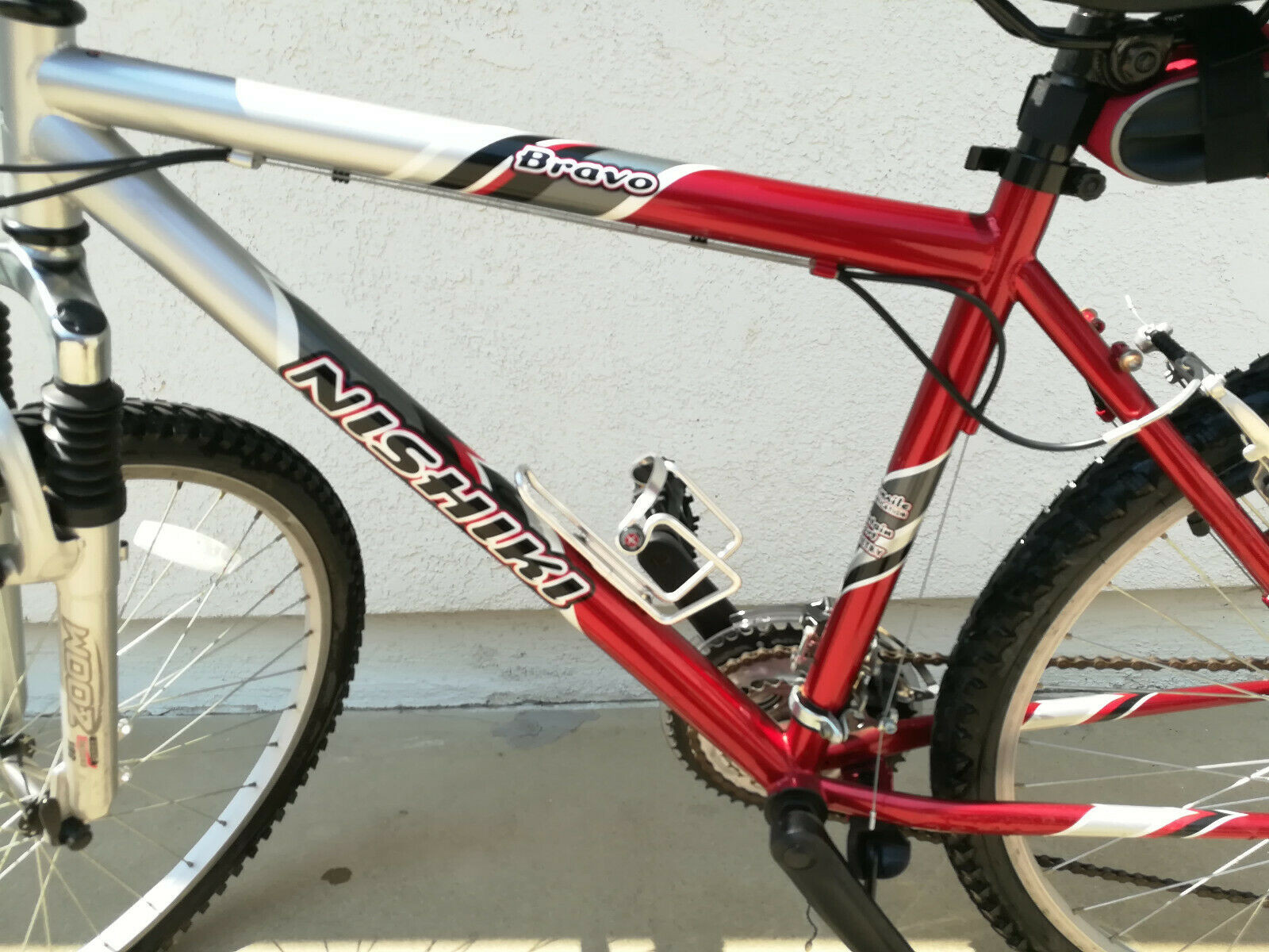 Used Men's Nishiki Bravo Shimano Mountain Bike, Red & Black Bike Sport Bike - Fresh Stock Dated December 2025