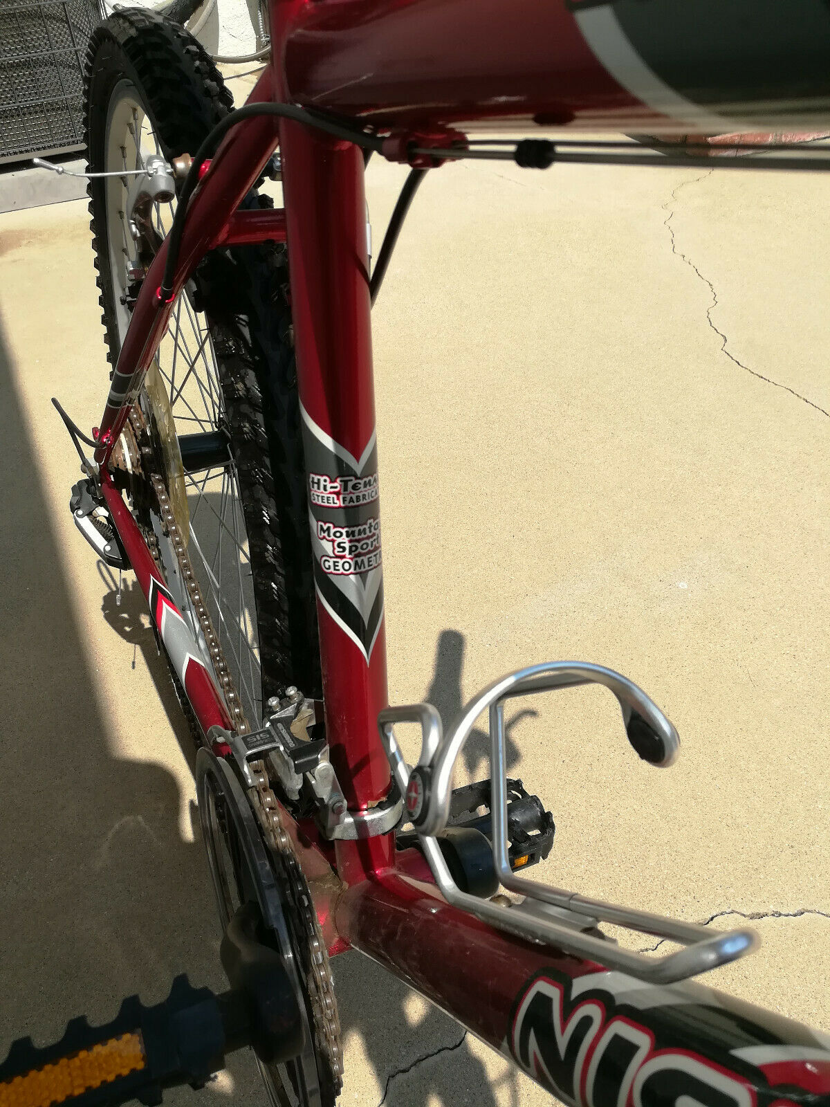 Used Men's Nishiki Bravo Shimano Mountain Bike, Red & Black Bike Sport Bike - Fresh Stock Dated December 2025